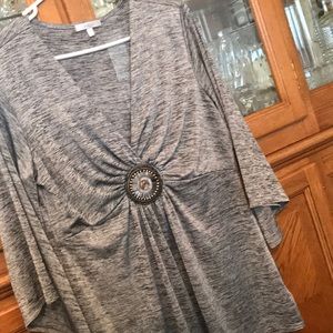 This a gray top would look nice with some jeans